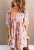 Printed half sleeve mini dress with floral pattern in pink, blue, and orange, made of 100% polyester.