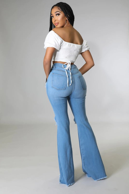 Knee Rip Flare Jean in Medium Wash - Teresa's Fashionista LLC