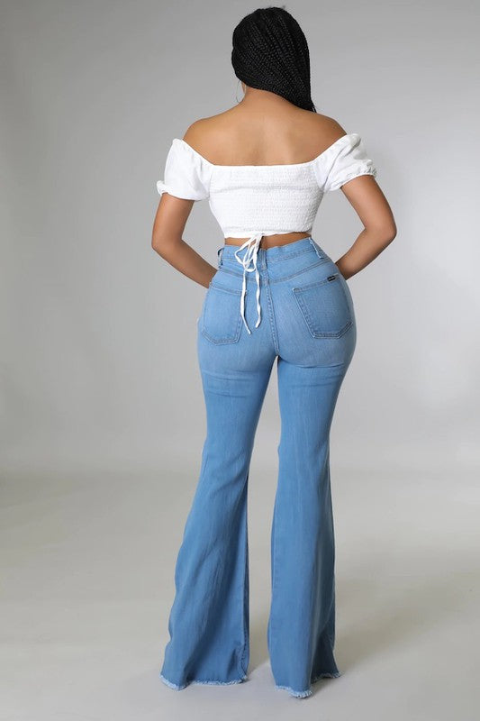 Knee Rip Flare Jean in Medium Wash - Teresa's Fashionista LLC