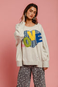 BiBi LOVE Heart Patch Slit French Terry Sweatshirt - Teresa's Fashionista LLC
