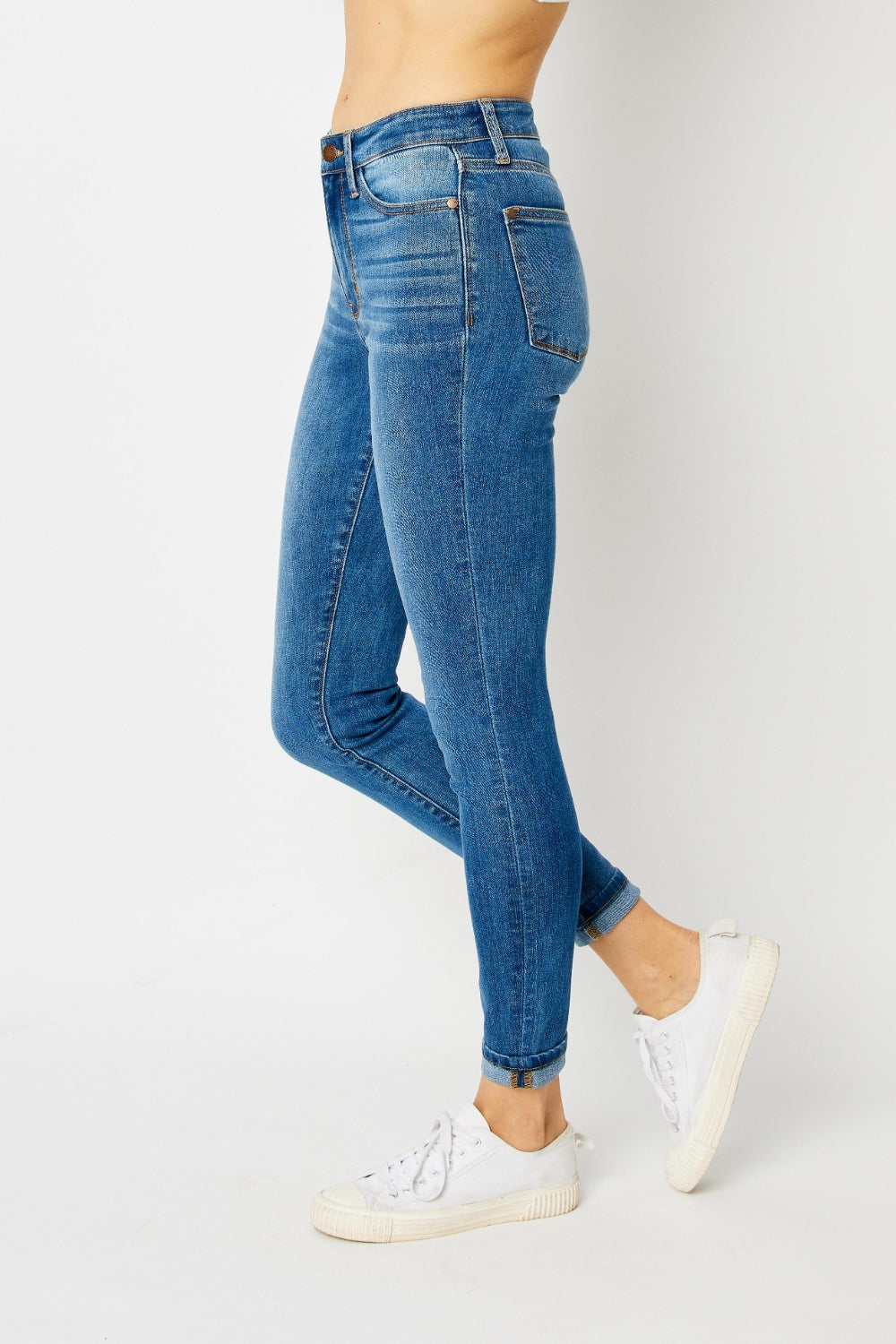 Judy Blue Full Size cuffed hem skinny jeans with a trendy and flattering fit, paired with white sneakers.