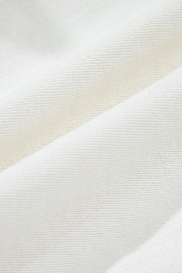 White raw hem high waist denim shorts with frayed edges and durable fabric