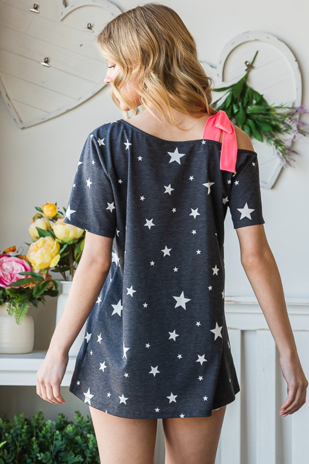 Heimish Full Size Star Print Asymmetrical Neck Short Sleeve Top-Teresa&#39;s Fashionista LLC