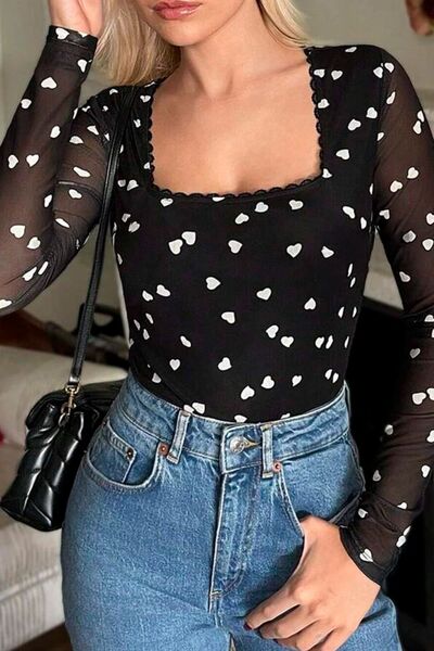 Heart square neck long sleeve bodysuit with lace detail and heart pattern.