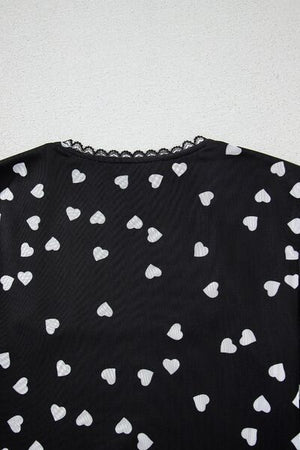 Heart square neck long sleeve bodysuit with lace detail and heart pattern.