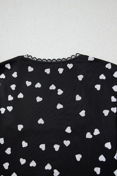 Heart square neck long sleeve bodysuit with lace detail and heart pattern.