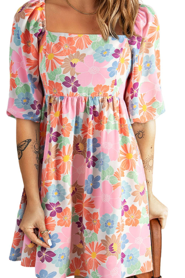 Floral printed half sleeve mini dress in pastel colors.
