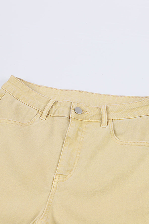 Raw Edge Mid Waist Flared Jeans with pockets and raw hem.