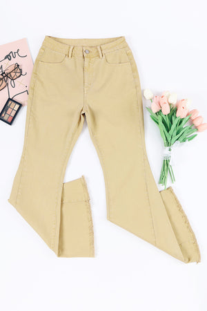 Raw edge mid waist flared jeans with pockets and slightly stretchy fabric.