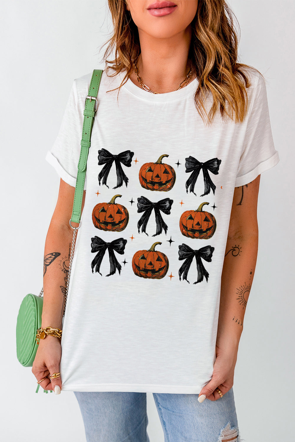 Pumpkin Round Neck Short Sleeve T-Shirt with Halloween design, featuring pumpkins and bows.