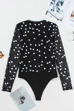 Heart square neck long sleeve semi-sheer bodysuit with lace detail and heart pattern.