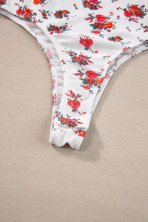 Floral frilled trim spaghetti strap bodysuit with red and orange flowers.