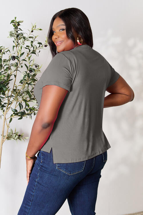 Basic Bae Full Size Round Neck Short Sleeve T-Shirt in gray, featuring a slit design and a slightly stretchy fit.