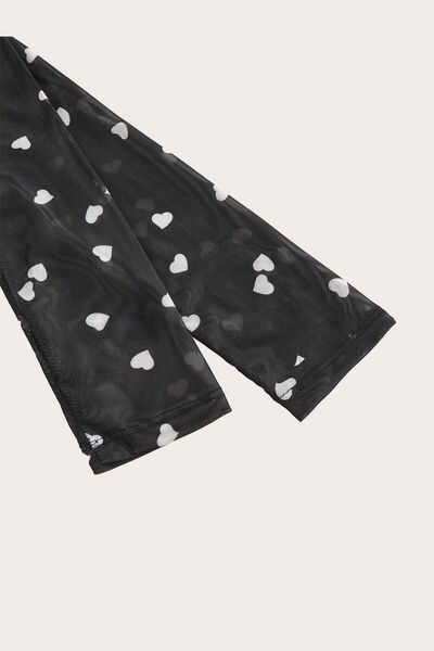 Heart square neck bodysuit with white heart patterns on semi-sheer black fabric.