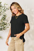Basic Bae Full Size Round Neck Short Sleeve T-Shirt in black, slightly stretchy, made from rayon and spandex.