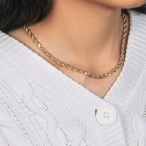 14k yellow gold solid diamond cut rope chain necklace 5mm width worn with white sweater