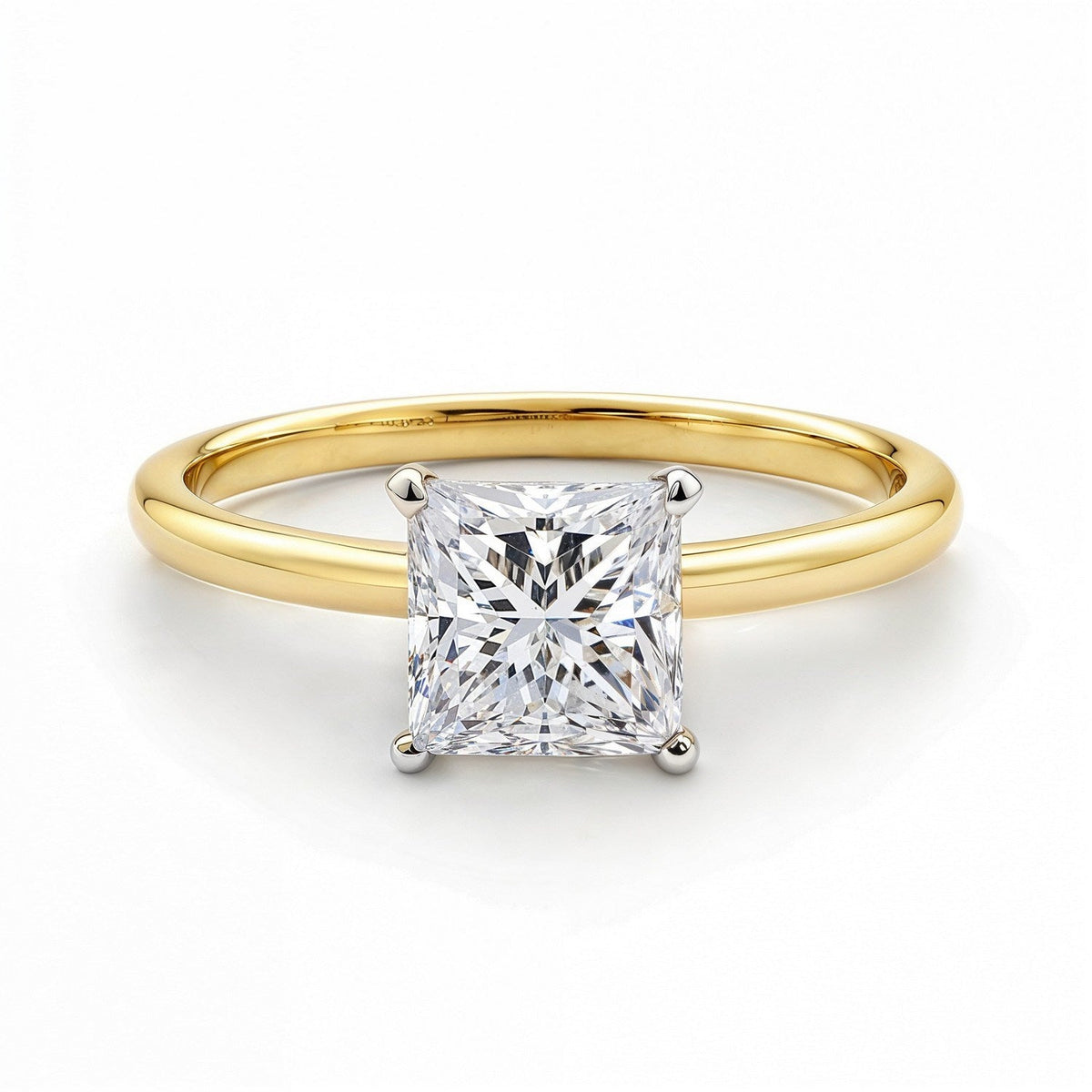 1 1/2 carat princess-cut lab-grown diamond solitaire ring in 14K yellow gold.
