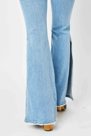Judy Blue Full Size Mid Rise Raw Hem Slit Flare Jeans-Teresa's Fashionista LLC
