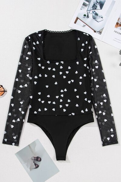 Heart square neck long sleeve bodysuit with lace detail and semi-sheer sleeves, featuring a heart pattern.