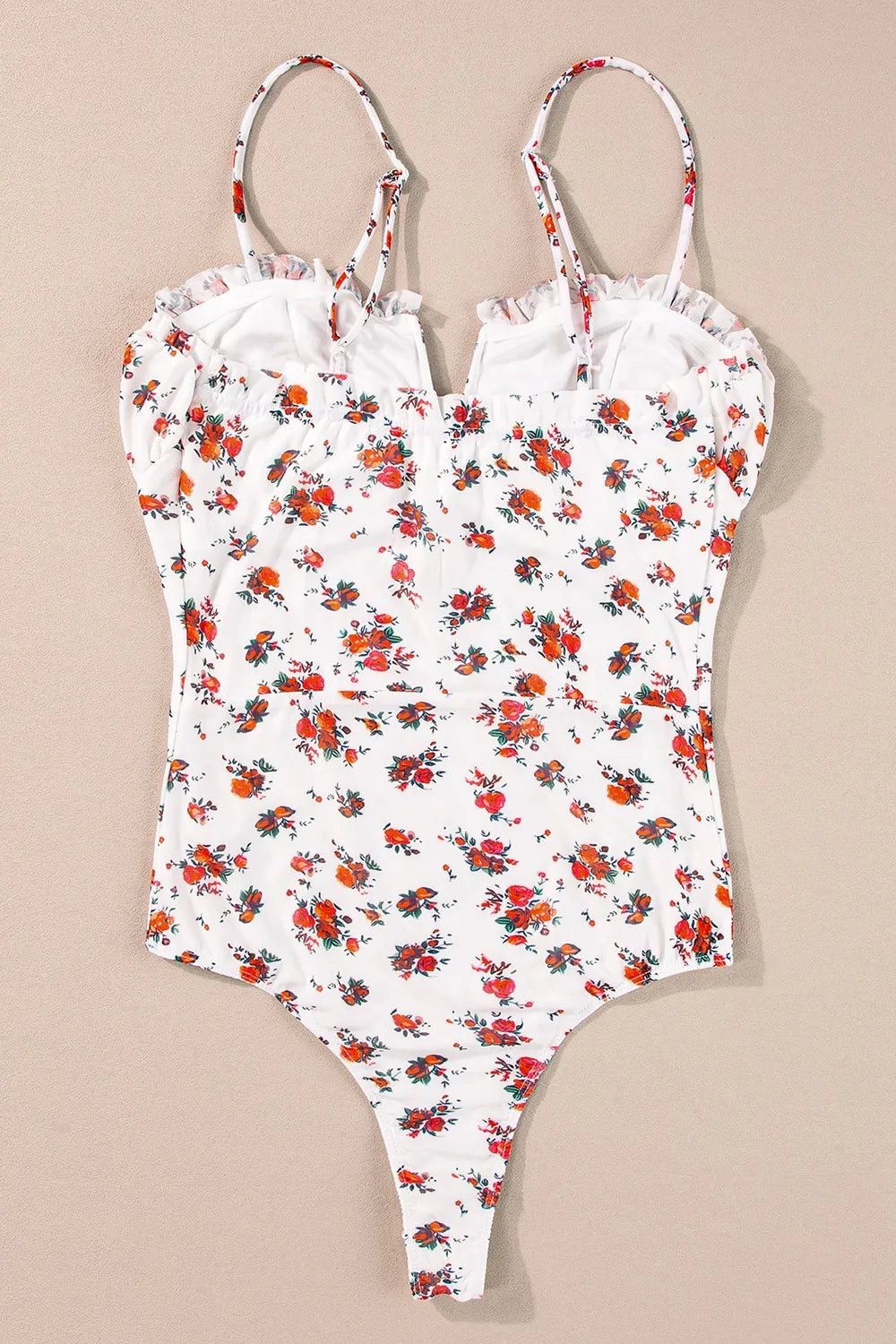 Floral frilled trim spaghetti straps bodysuit with delicate floral pattern.