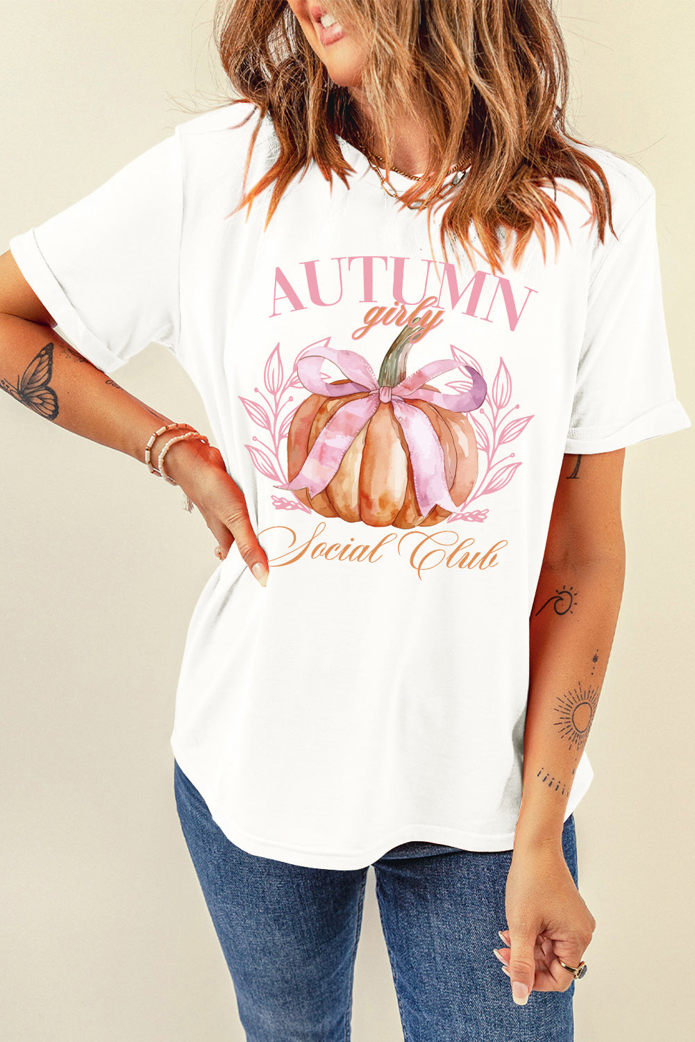 Pumpkin graphic round neck short sleeve T-shirt with "Autumn Girls Social Club" text.