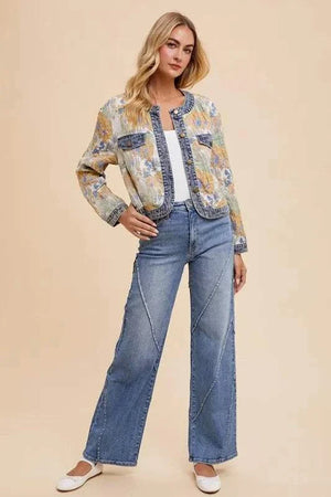 Woman wearing Annie Wear decorative seams wide leg jeans with pockets and slight stretch