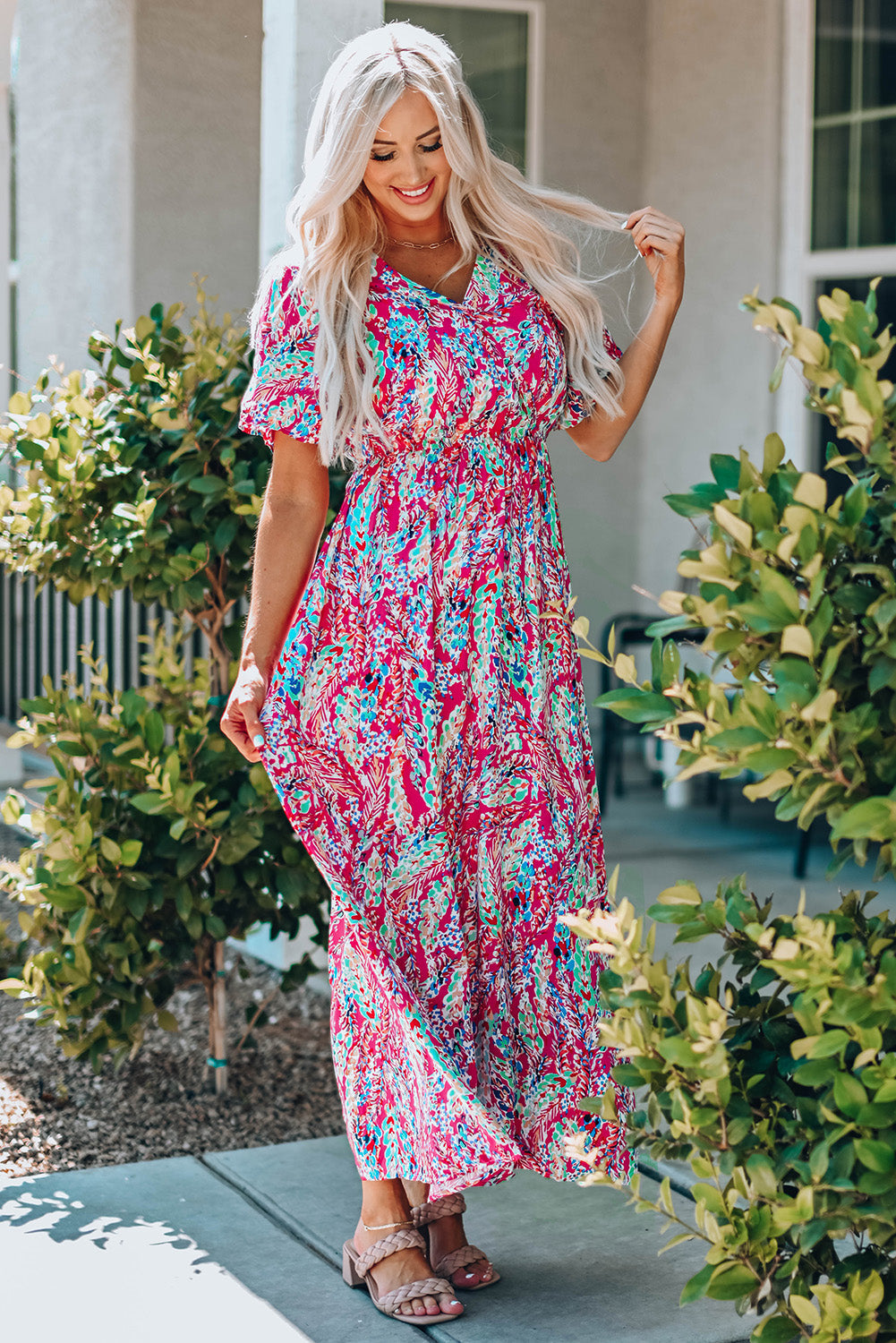 Multicolored V-neck maxi dress with short sleeves and a chic, classy style.