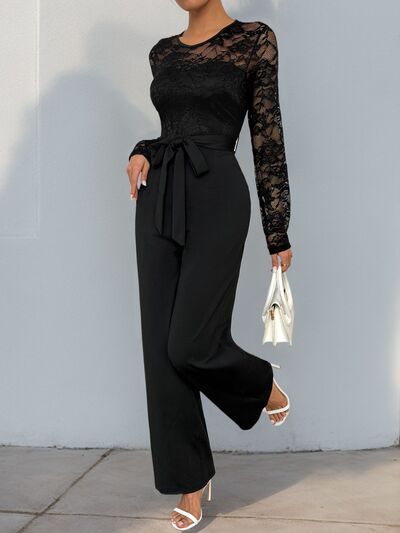Perfee lace round neck long sleeve jumpsuit, black semi-sheer lace top, tied waist, polyester blend.