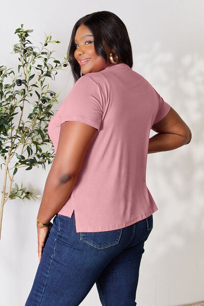 Basic Bae full-size round neck short sleeve t-shirt with side slit, worn by a model.