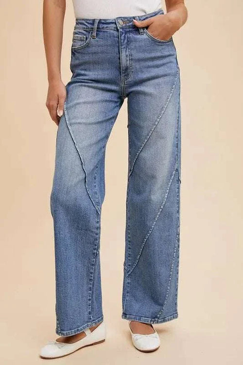 Woman wearing Annie Wear decorative seams wide leg jeans with stylish pocketed design