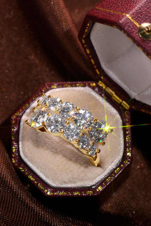 Moissanite jewelry in gold-plated 925 sterling silver ring in decorative box.