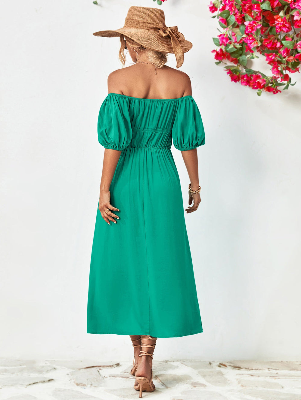 Chic off-shoulder balloon sleeve midi dress in solid green with A-line hem and puff sleeves.
