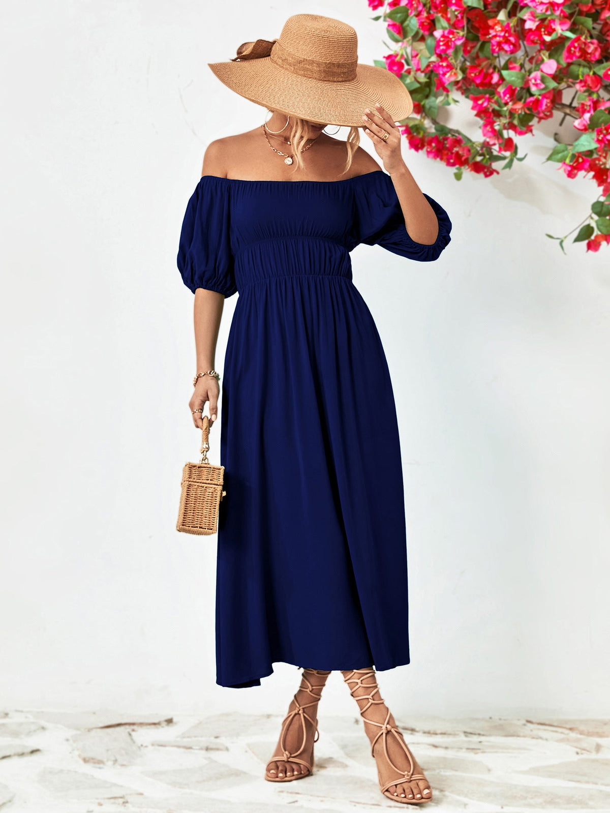 Off-shoulder balloon sleeve midi dress with puff sleeves, navy blue, chic A-line style.