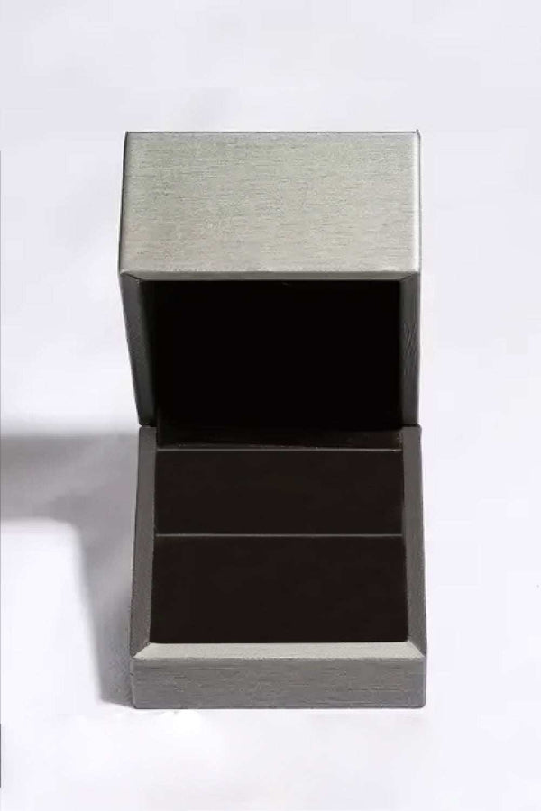 Moissanite 925 sterling silver ring with a minimalist style, presented in an elegant matching box.