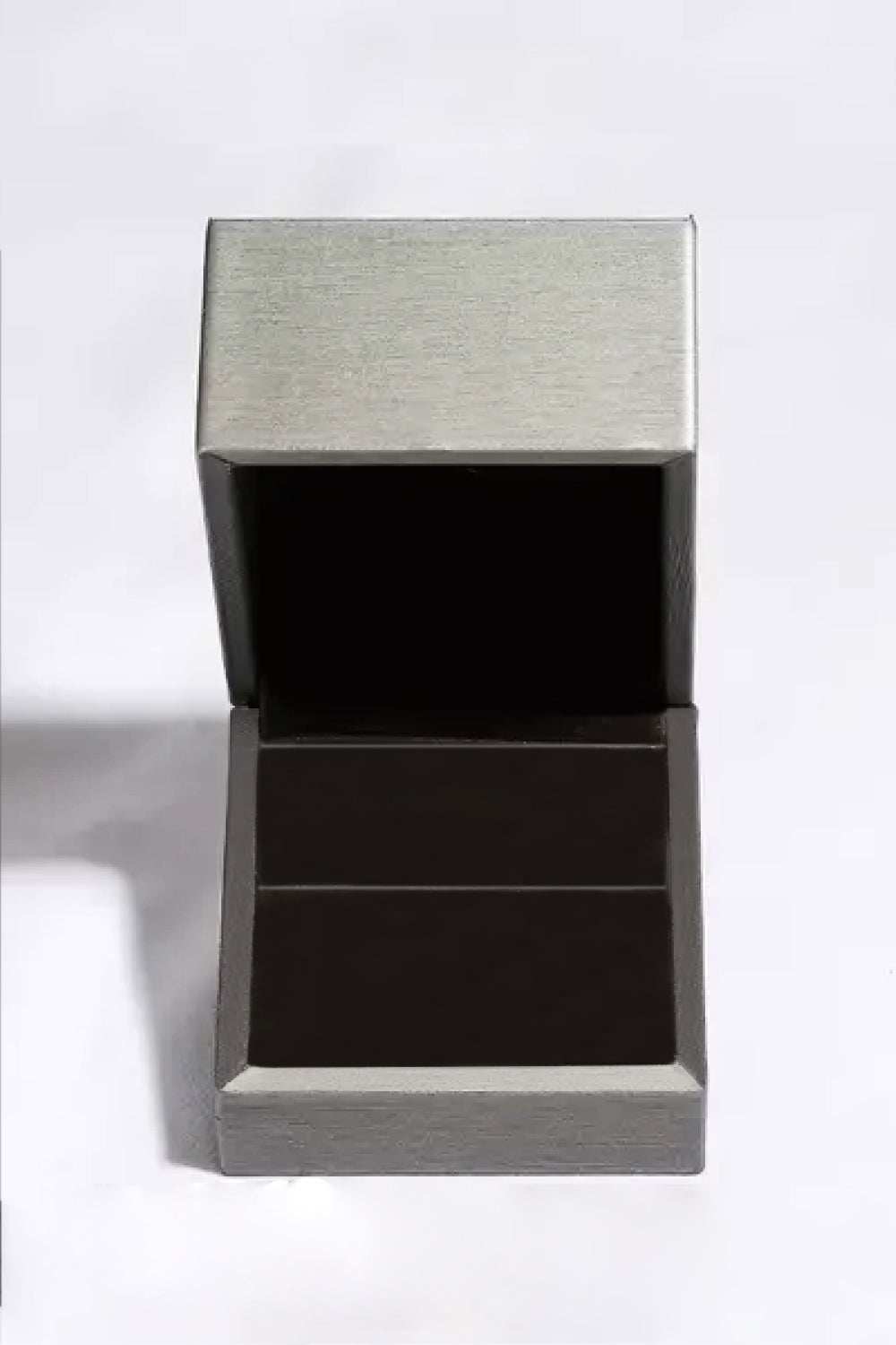 Moissanite 925 sterling silver ring with a minimalist style, presented in an elegant matching box.