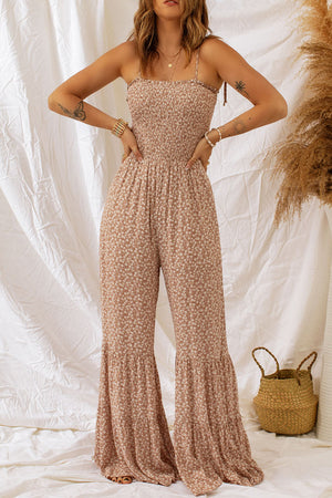 Floral spaghetti strap smocked wide leg jumpsuit, classy style.