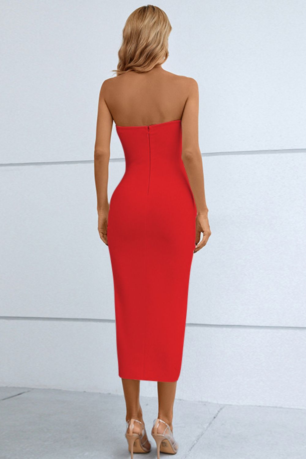 Cutout strapless drawstring detail split bandage dress in red with sweetheart neckline, sleeveless design, and midi length.