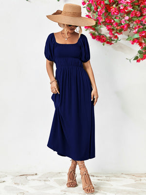 Off-shoulder balloon sleeve midi dress with puff sleeves, chic solid design, and A-line hem.