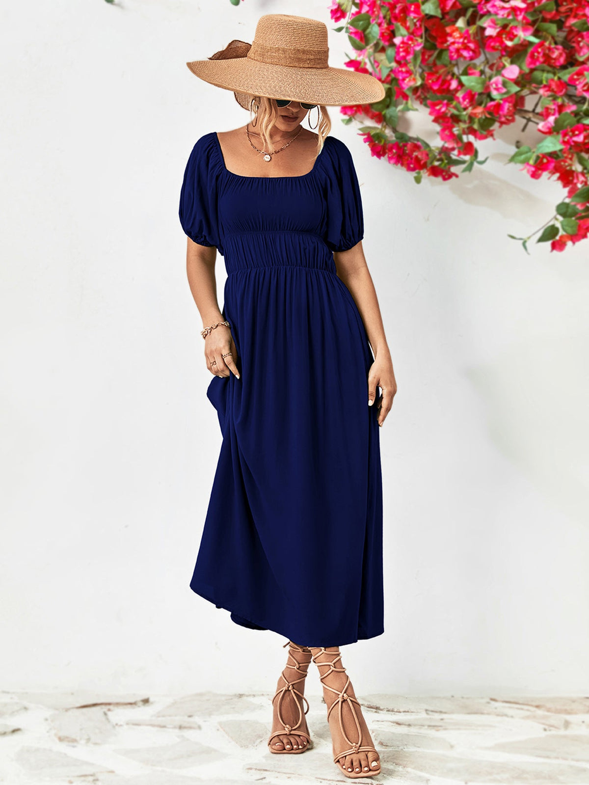Off-shoulder balloon sleeve midi dress with puff sleeves, chic solid design, and A-line hem.