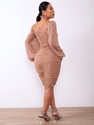 Chic knee-length zip-back ruched bodycon dress with long sleeves and square neckline.
