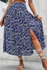 Navy ditsy floral high waist midi skirt with side slit and smocked waistband