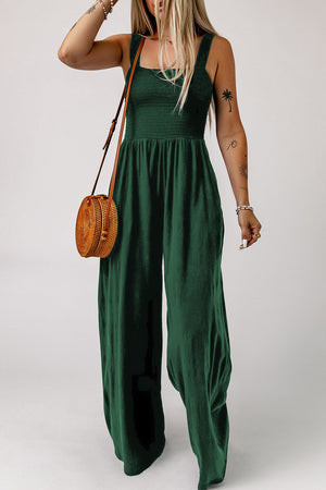 Smocked square neck wide leg jumpsuit with pockets, solid color, sleeveless, classy style.