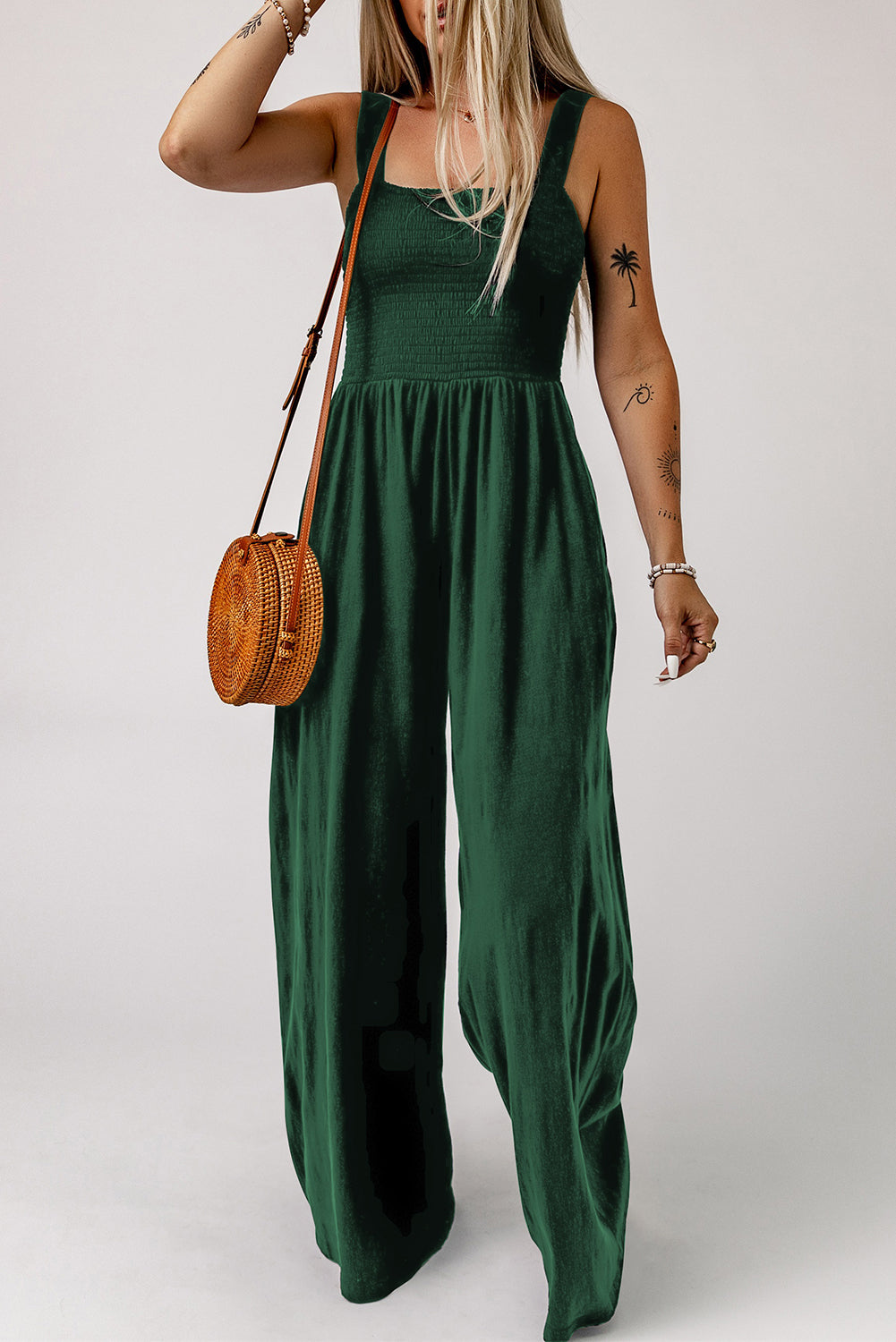 Smocked square neck wide leg jumpsuit with pockets, solid color, sleeveless, classy style.