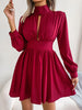 Cutout turtleneck A-line mini dress with long sleeves in solid color.