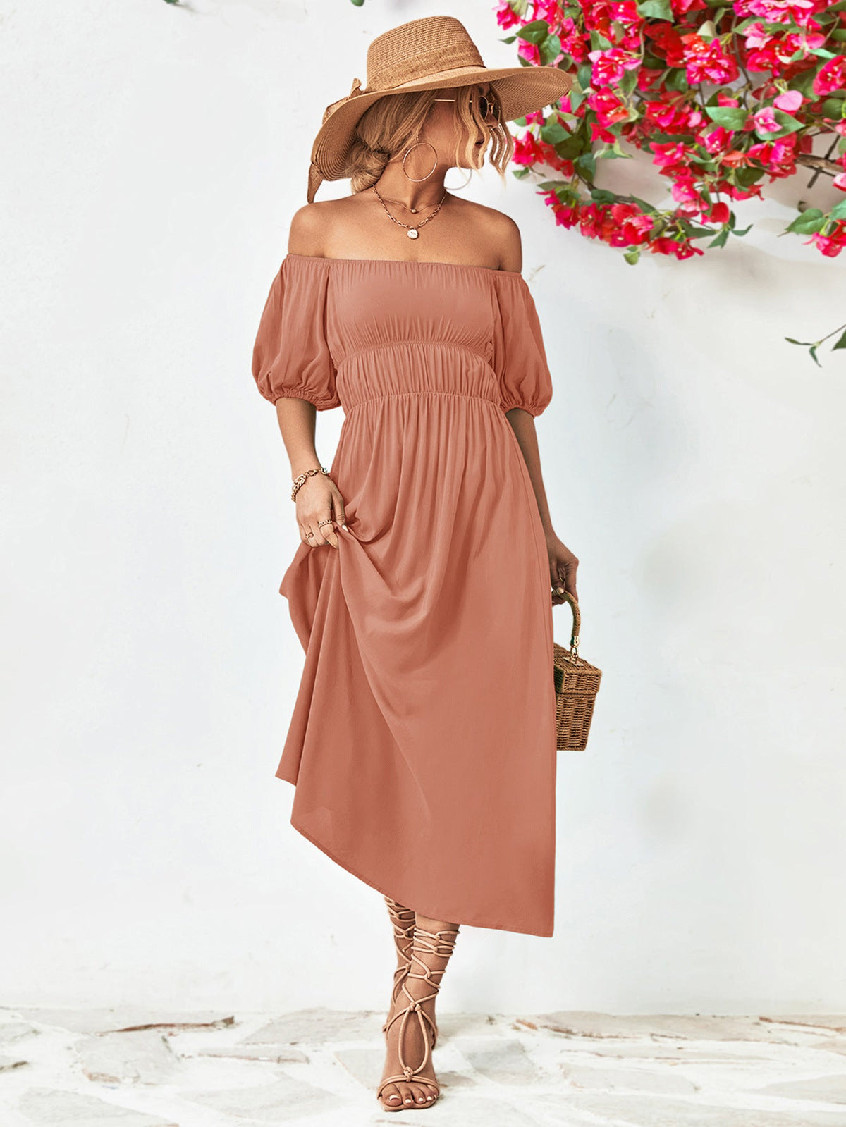 Off-shoulder balloon sleeve midi dress with A-line hem and chic style.