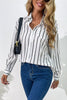 Vertical stripes button down shirt with long sleeves and a turn-down collar.