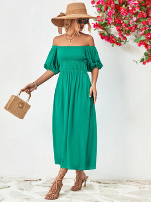 Off-shoulder balloon sleeve midi dress in solid green with chic A-line hem and puff sleeves.
