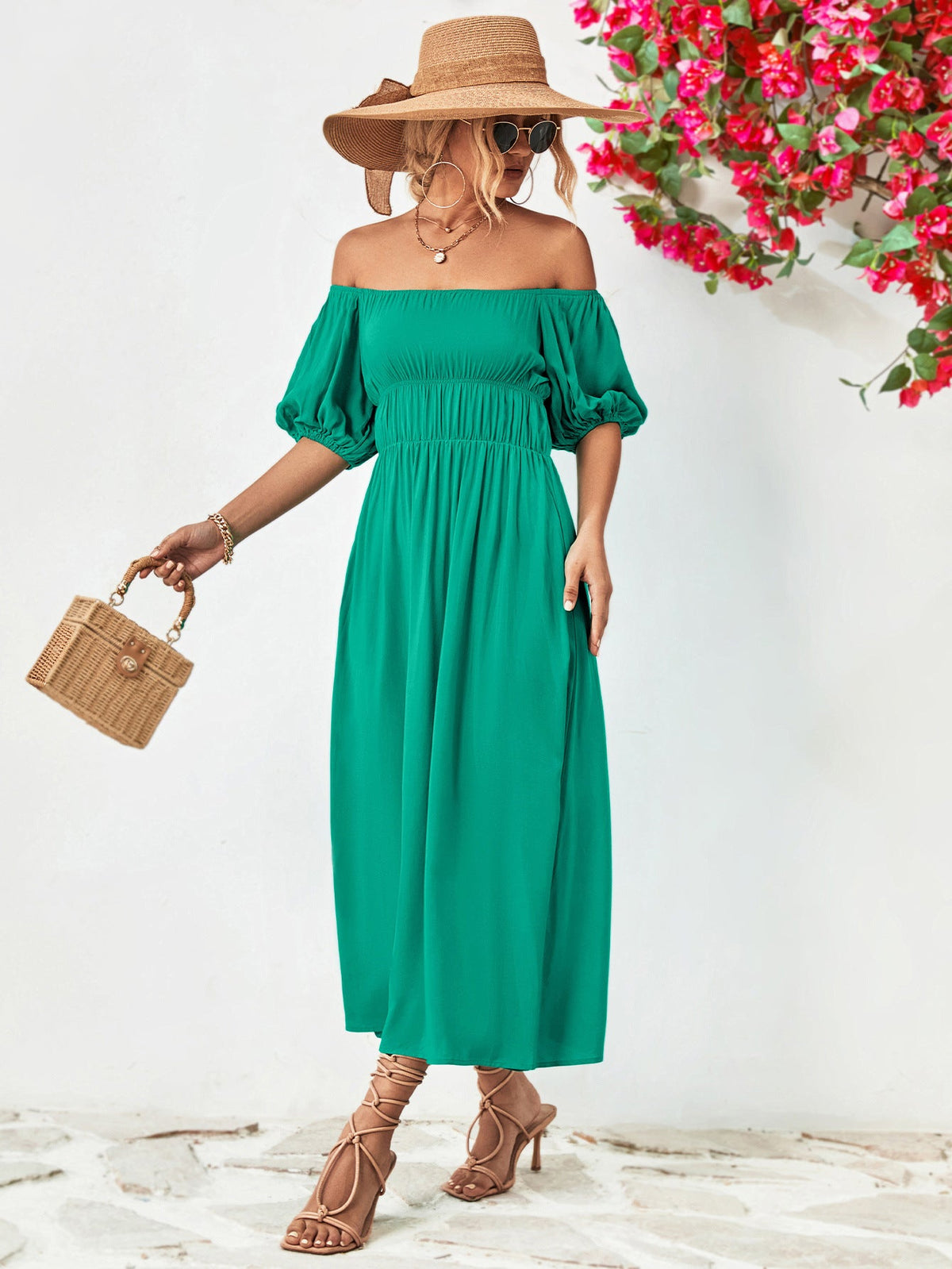 Off-shoulder balloon sleeve midi dress in solid green with chic A-line hem and puff sleeves.