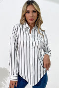 Vertical Stripes Button Down Shirt with long sleeves and asymmetrical hem.