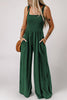 Smocked square neck wide-leg jumpsuit with pockets, sleeveless, solid green, classy style.